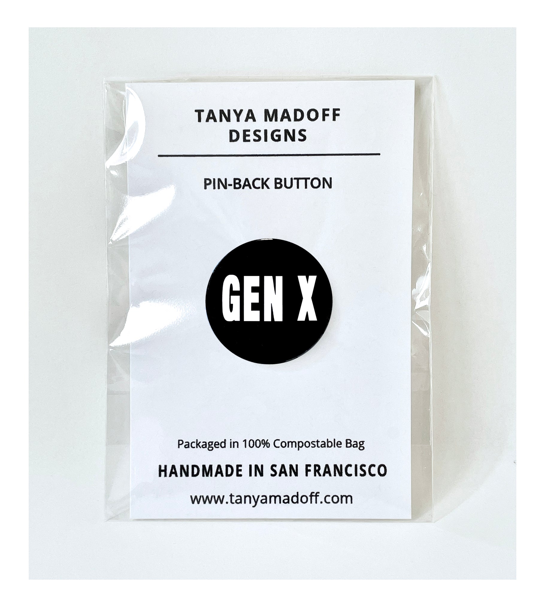 Gen X (Generation X) black and white pinback button, packaged on recycled paper, in 100% compostable clear glassine bag