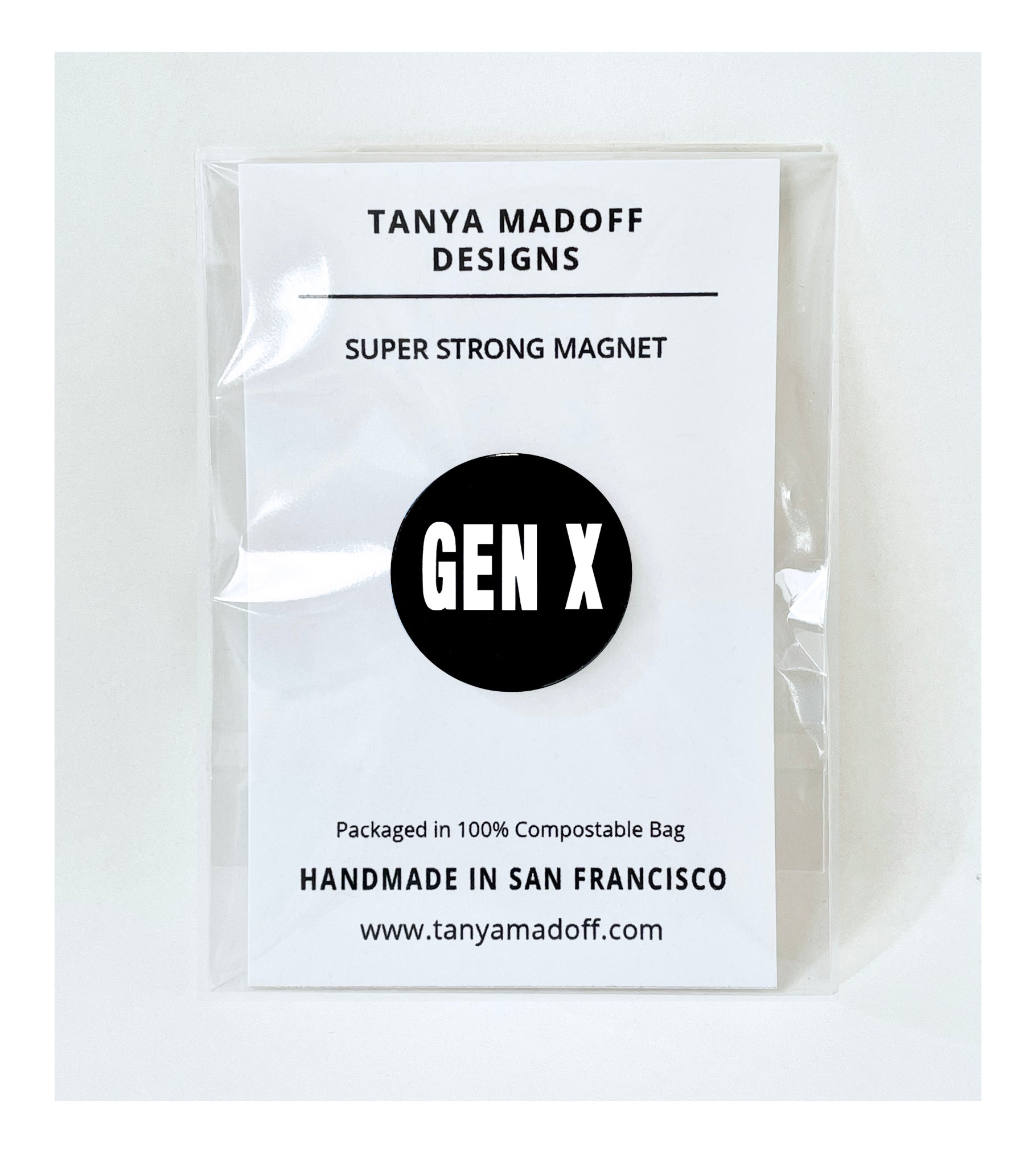 Gen X (Generation X) black and white extra strength magnet, packaged on recycled paper, in 100% compostable clear glassine bag