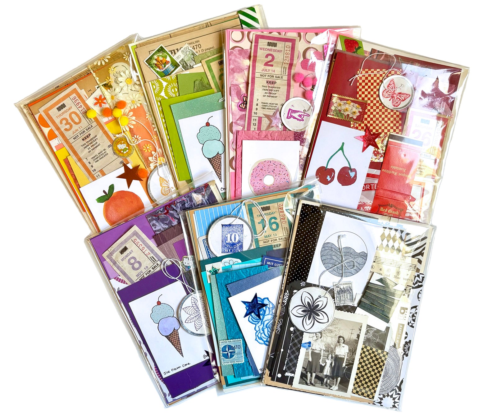 Junk Journal Scrap Pack – A delightful mix of authentic Vintage Ephemera and contemporary items for Creative Collaging, shown in monochromatic packs of orange, green, pink, red, purple, blue and black.