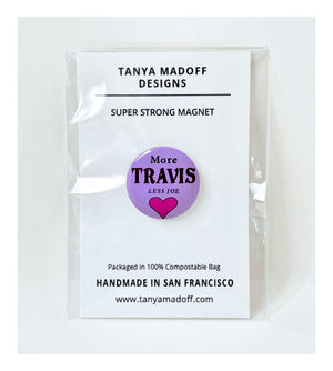 More Travis, Less Joe 1" strong magnet, Taylor Swift and Travis Kelce inspired, with black lettering and magenta heart on purple background, packaged on recycled paper, in 100% compostable clear glassine bag