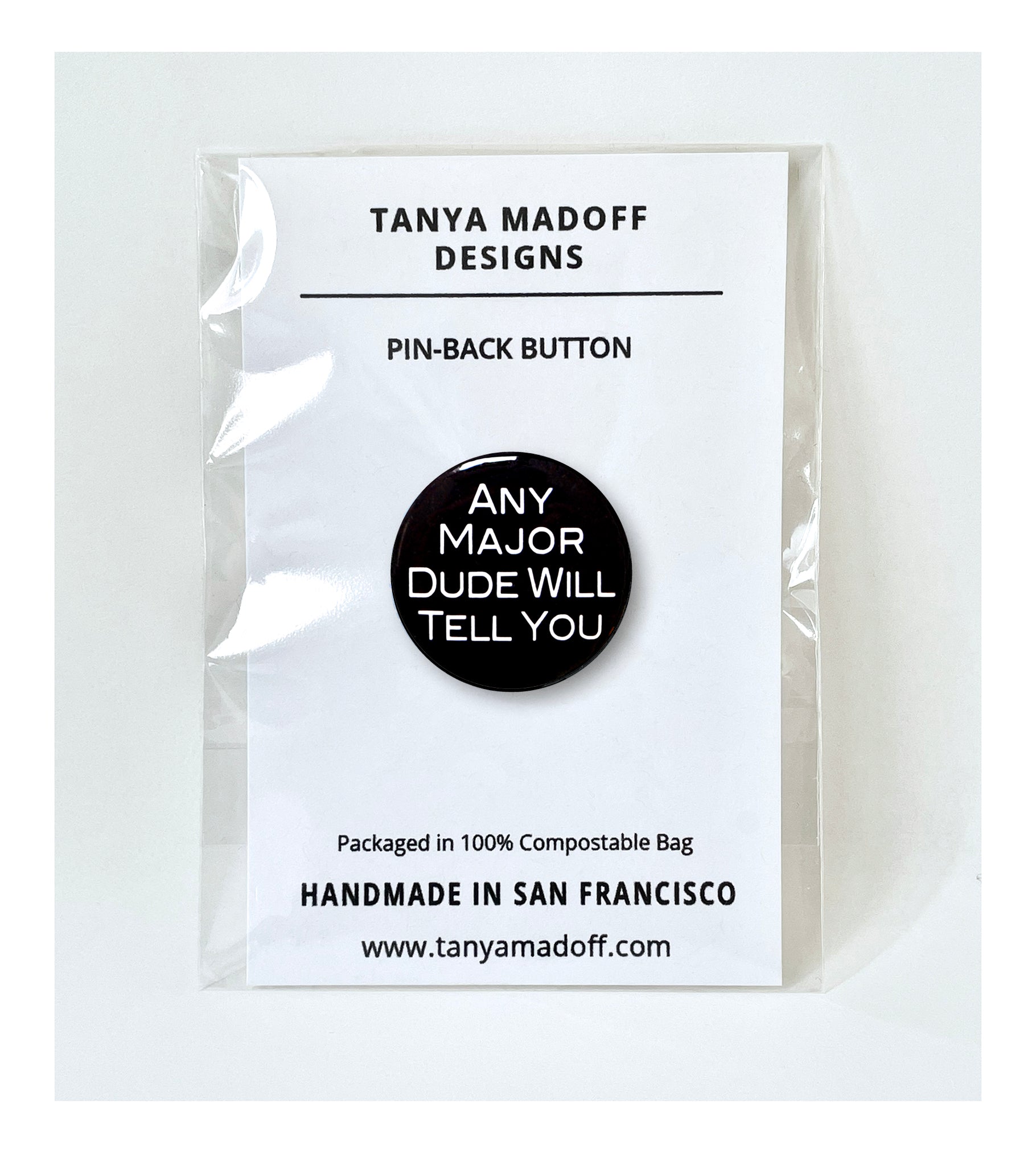 Any Major Dude Will Tell You - 1" Pinback Button, shown in clear compostable packaging.