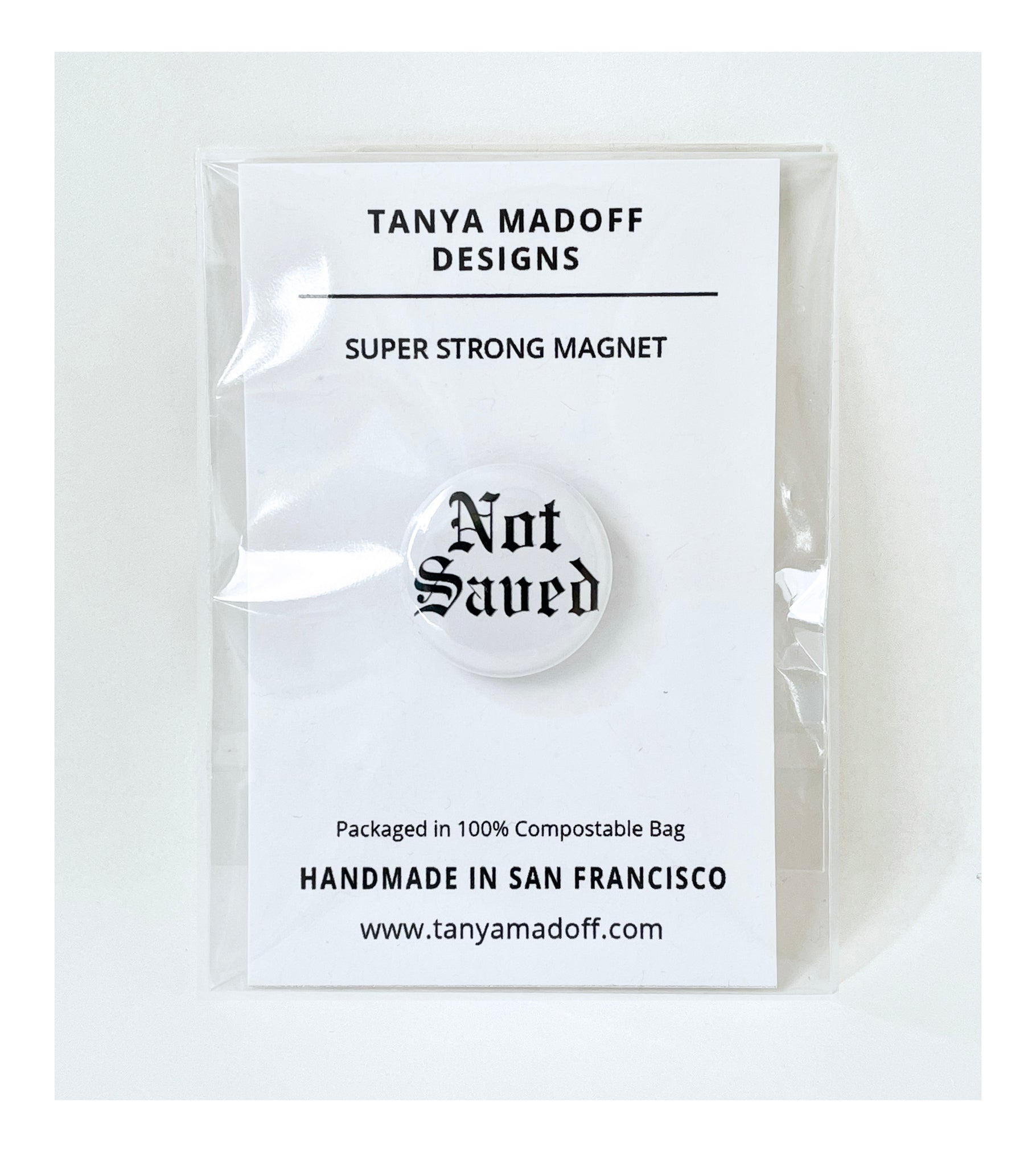 Not Saved 1" Magnet, packaged on recycled paper, in 100% compostable clear glassine bag