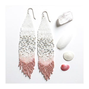 Extra long Handmade Seed Bead Fringe Earrings made with white, clear and pale gray beads, ending with light shimmering pink and dark salmon pink at the ends